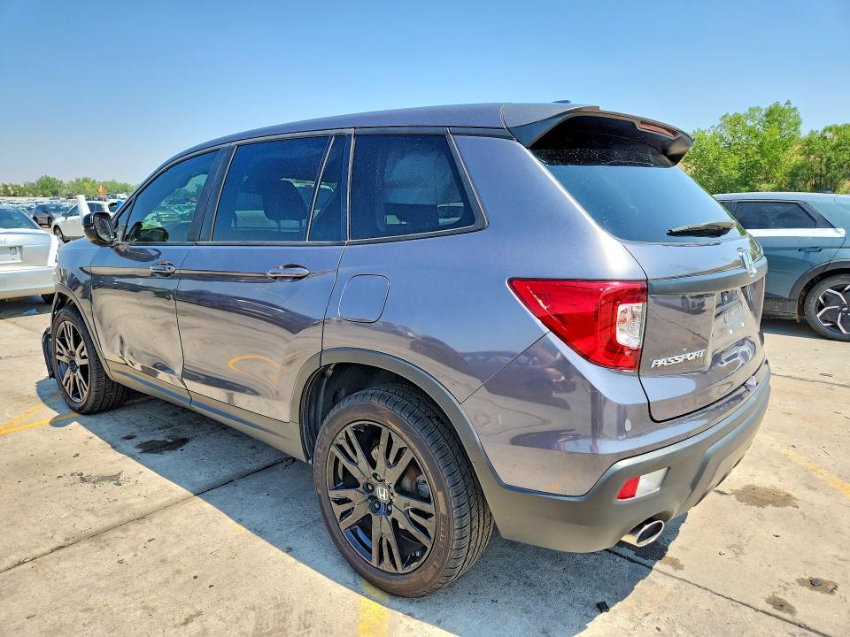 Photo 2 from auction – 2021 HONDA PASSPORT with VIN 5FNYF8H27MB043523