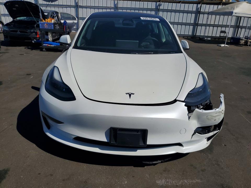 Photo 5 from auction – 2023 TESLA MODEL 3 with VIN 5YJ3E1EA5PF672878