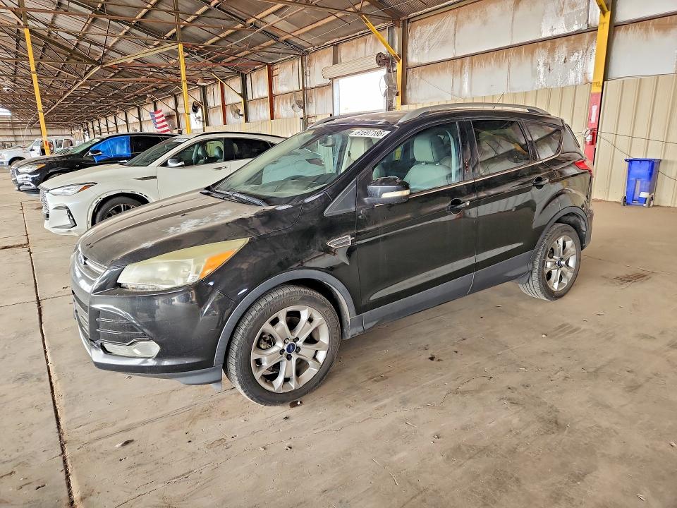 FORD ESCAPE 2014 with VIN 1FMCU0J97EUC85421 - Photo from auction