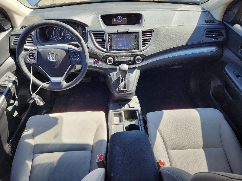 Photo 8 from auction – 2015 HONDA CR-V with VIN 2HKRM4H52FH642458