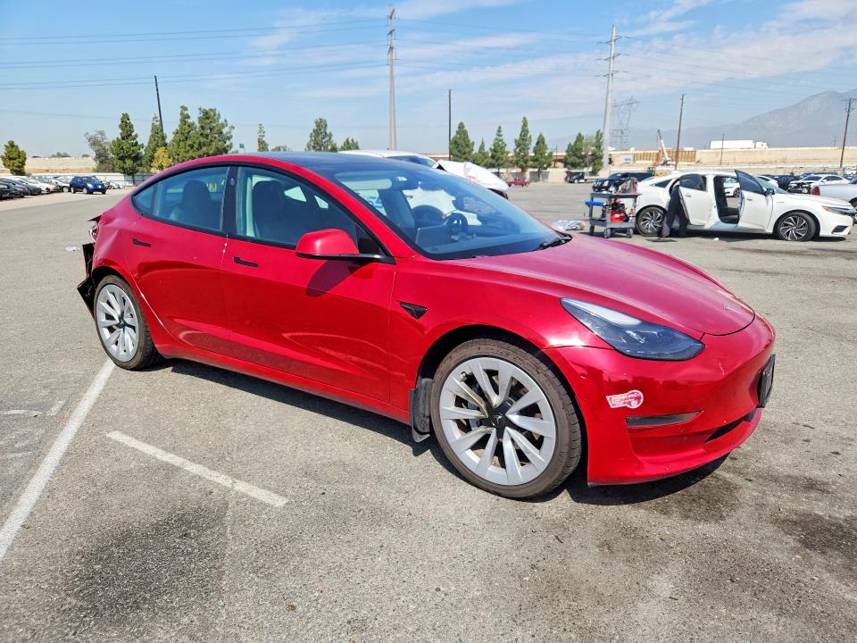 Photo 4 from auction – 2022 TESLA MODEL 3 with VIN 5YJ3E1EA9NF143530