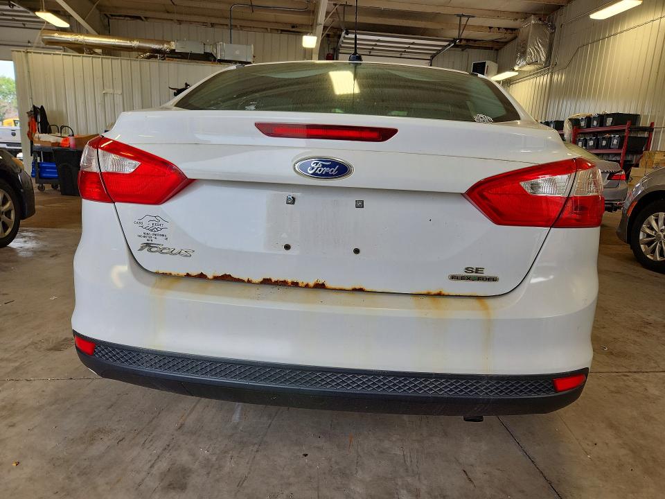 Photo 6 from auction – 2014 FORD FOCUS with VIN 1FADP3F22EL277090