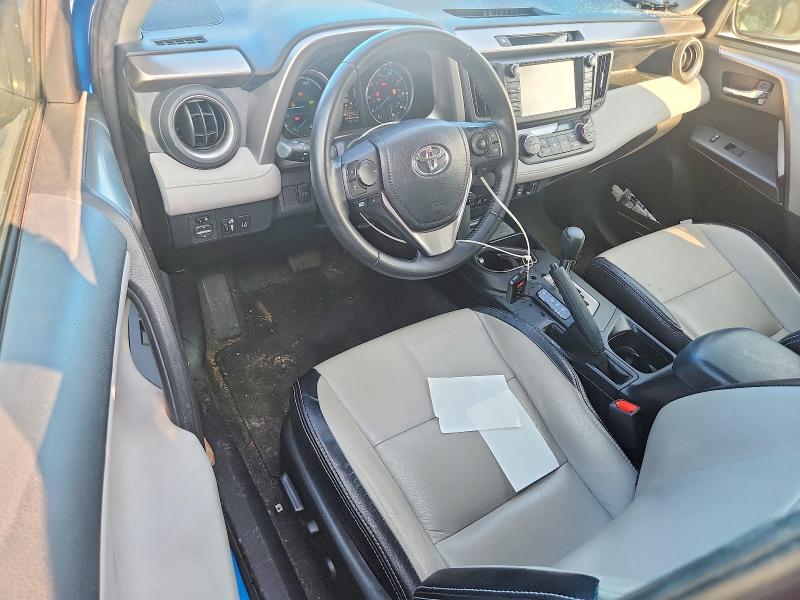 Photo 8 from auction – 2018 TOYOTA RAV4 HYBRID with VIN JTMRJREVXJD222066