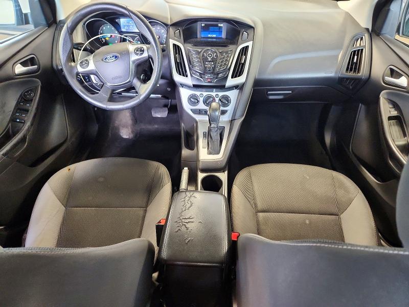 Photo 8 from auction – 2014 FORD FOCUS with VIN 1FADP3F22EL277090