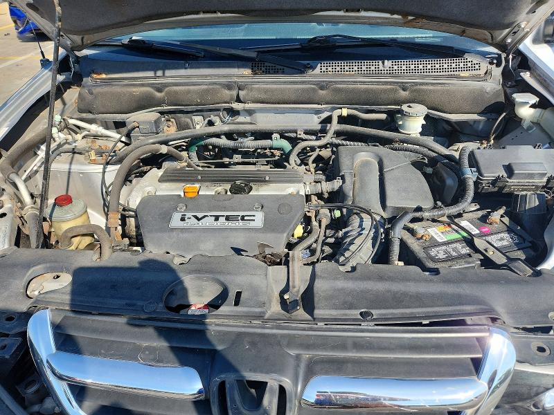 Photo 12 from auction – 2004 HONDA CR-V with VIN JHLRD78494C032593