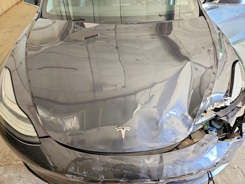Photo 11 from auction – 2018 TESLA MODEL 3 with VIN 5YJ3E1EA5JF034623