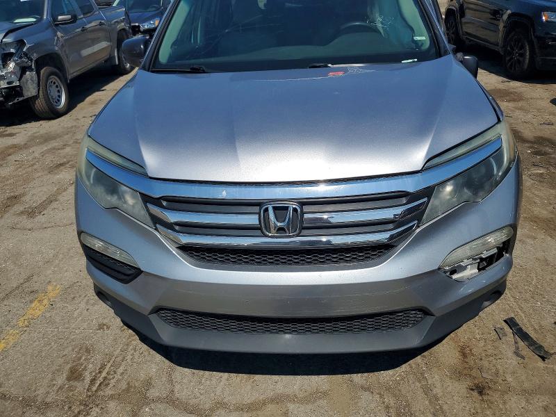 Photo 12 from auction – 2016 HONDA PILOT with VIN 5FNYF6H16GB053220