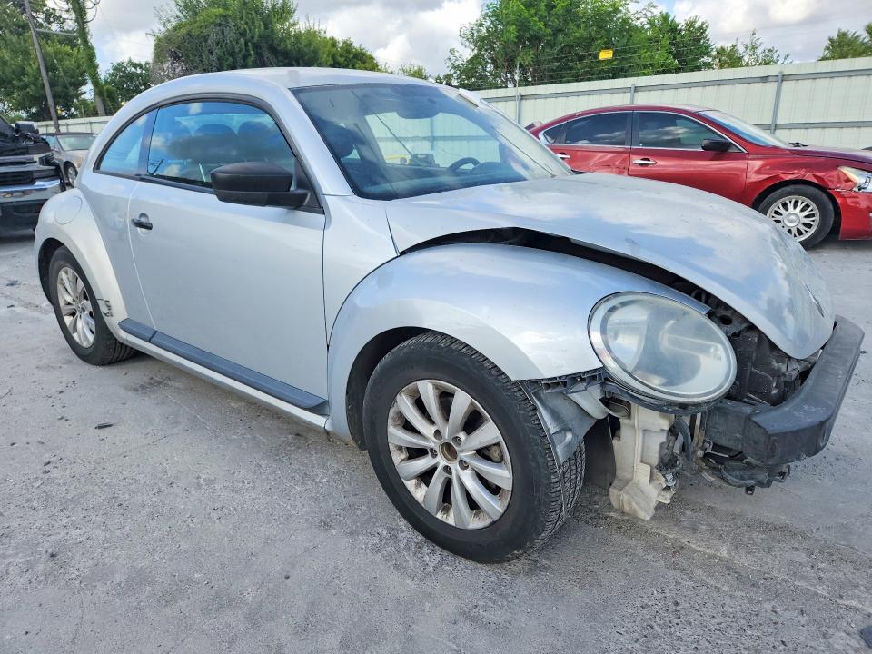 Photo 4 from auction – 2013 VOLKSWAGEN BEETLE with VIN 3VWFP7AT9DM660867