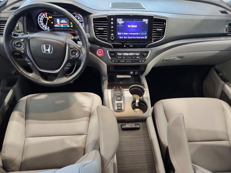 Photo 8 from auction – 2022 HONDA RIDGELINE with VIN 5FPYK3F70NB015231