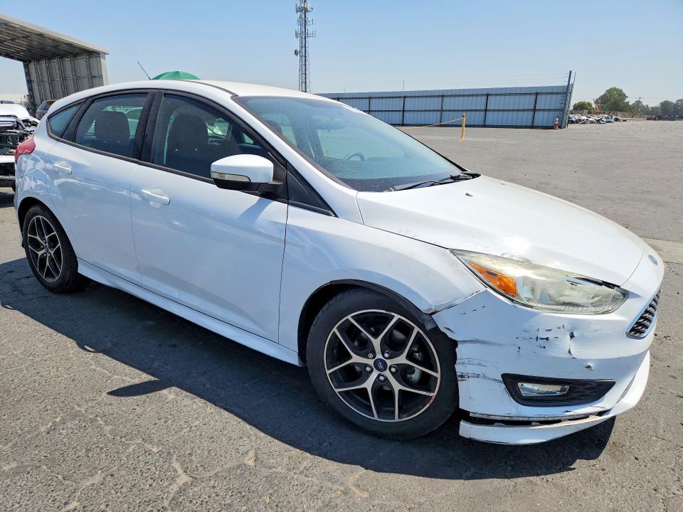Photo 4 from auction – 2015 FORD FOCUS with VIN 1FADP3K2XFL222054