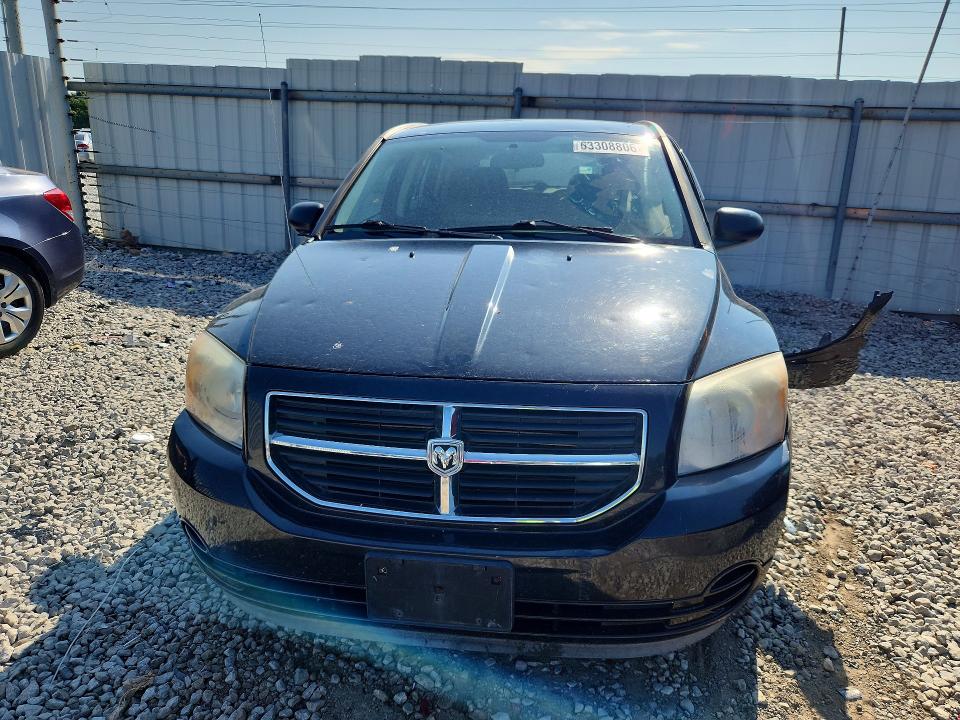 Foto 5 de la subasta – 2009 DODGE CALIBER con VIN 1B3HB48A99D259563