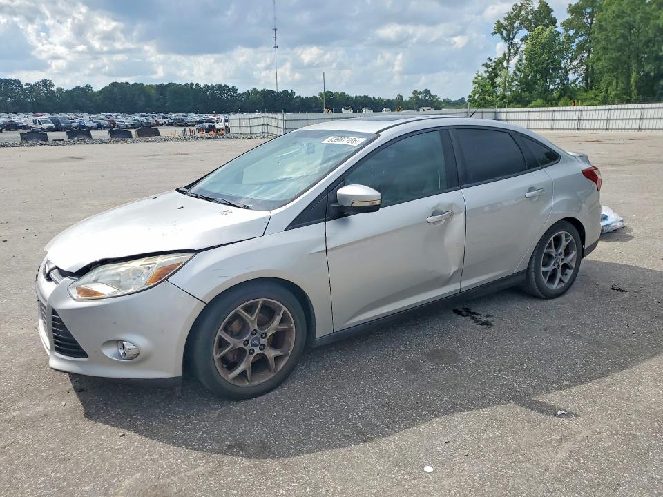 FORD FOCUS 2014 with VIN 1FADP3F23EL102346 - Photo from auction