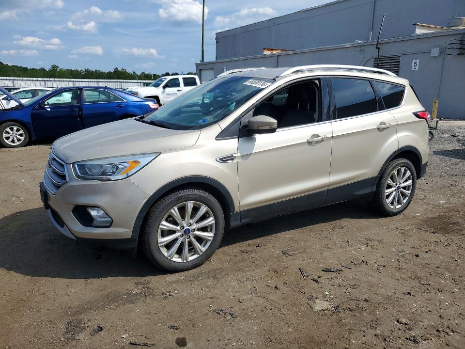 FORD ESCAPE 2017 with VIN 1FMCU9J90HUC07796 - Photo from auction