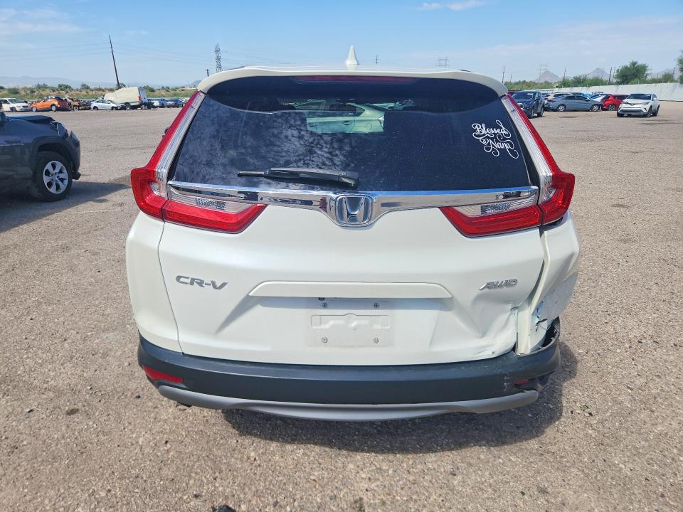 Photo 6 from auction – 2017 HONDA CR-V with VIN 2HKRW2H55HH668893