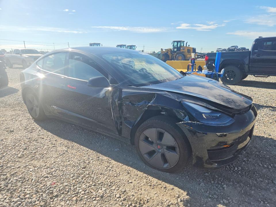 Photo 4 from auction – 2021 TESLA MODEL 3 with VIN 5YJ3E1EB2MF059413
