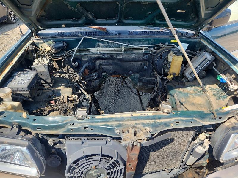 Photo 11 from auction – 2000 HONDA PASSPORT with VIN 4S6DM58W7Y4415366