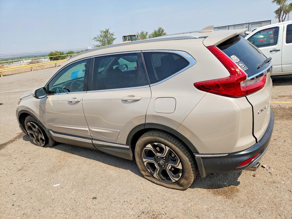 Photo 2 from auction – 2018 HONDA CR-V with VIN 5J6RW2H97JL004285
