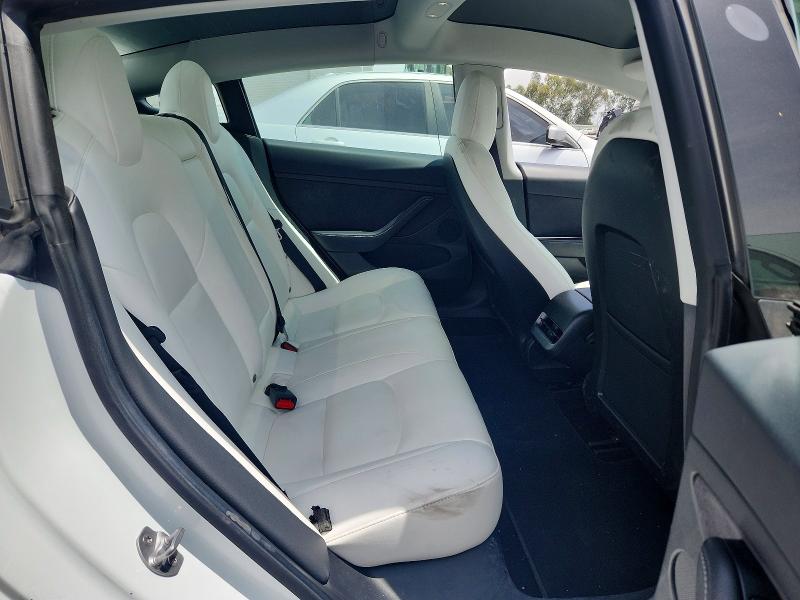 Photo 10 from auction – 2021 TESLA MODEL 3 with VIN 5YJ3E1EB0MF000554