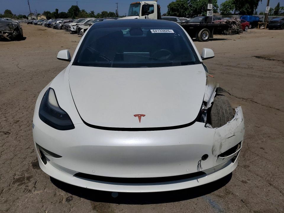 Снимка 5 от търг – 2021 TESLA MODEL 3 с VIN 5YJ3E1EA0MF030421