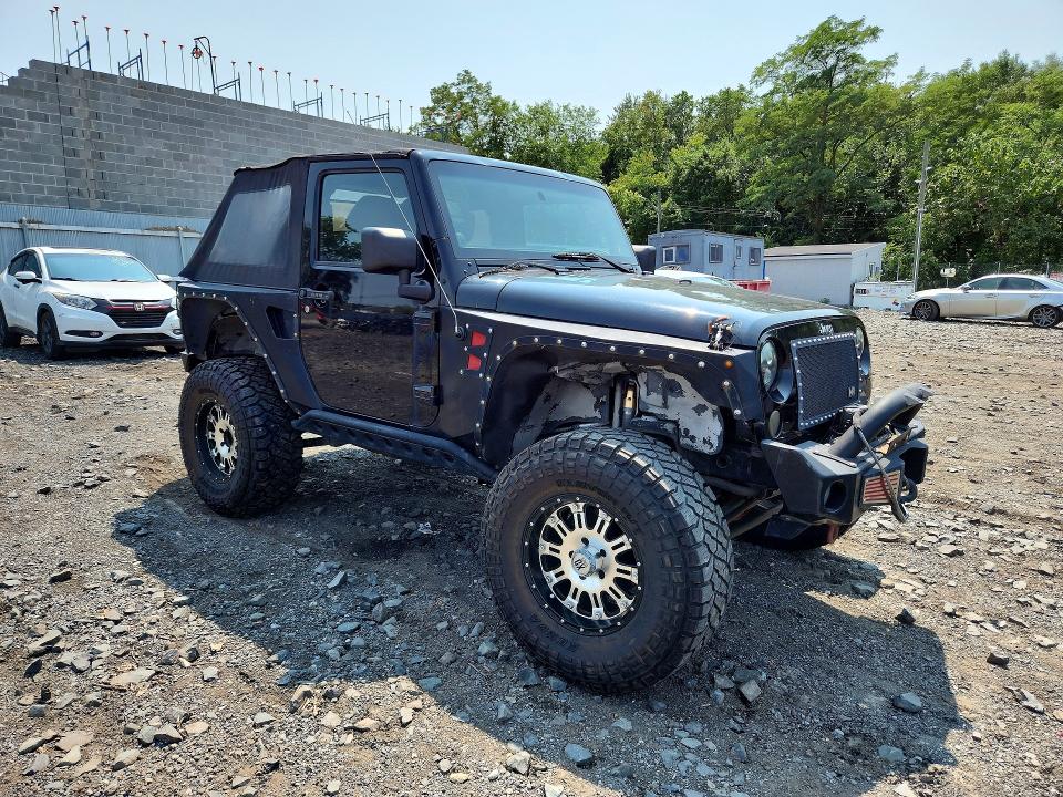 Photo 4 from auction – 2011 JEEP WRANGLER with VIN 1J4AA2D15BL516110