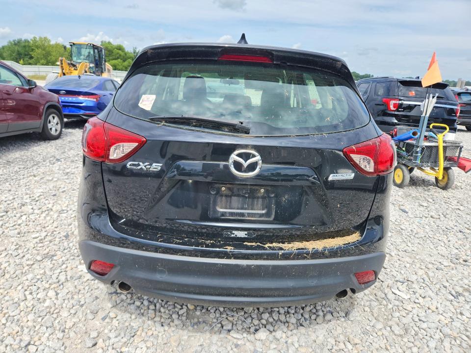 Photo 6 from auction – 2013 MAZDA CX-5 with VIN JM3KE2BEXD0120996
