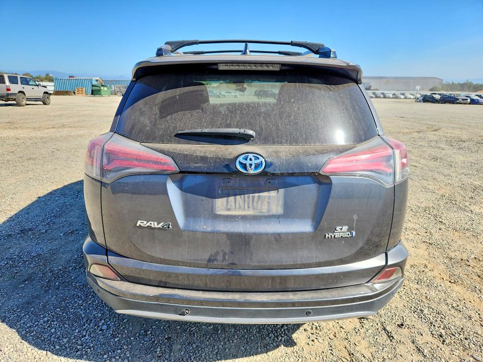 Photo 6 from auction – 2018 TOYOTA RAV4 HV with VIN JTMJJREV4JD163528