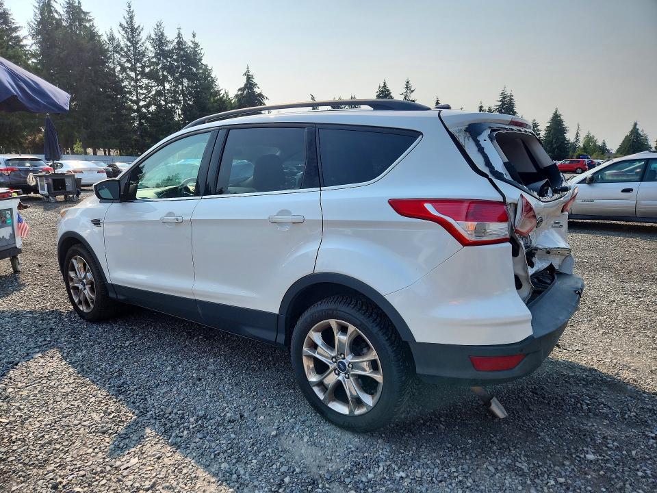 Photo 2 from auction – 2016 FORD ESCAPE with VIN 1FMCU9GX7GUA68772