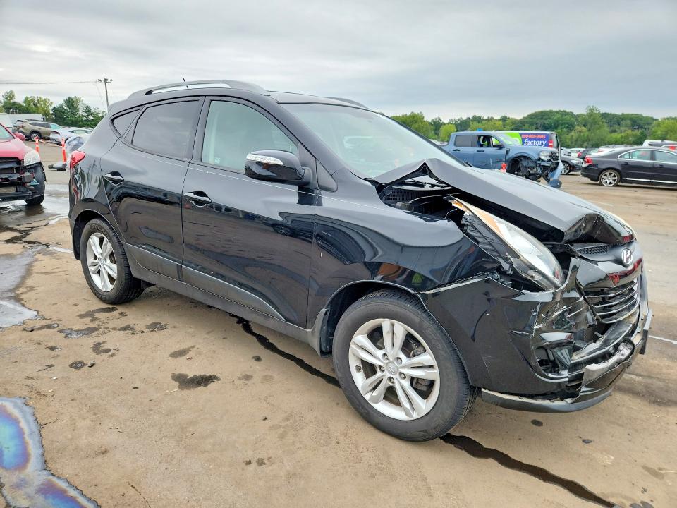 Photo 4 from auction – 2012 HYUNDAI TUCSON with VIN KM8JUCAC4CU419478