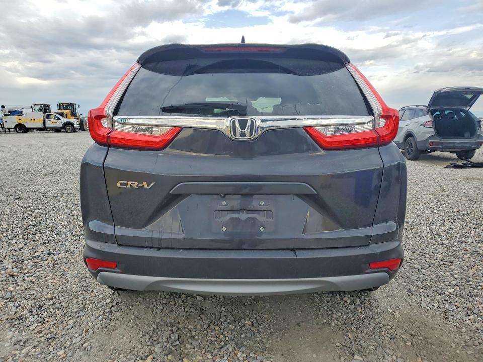Photo 6 from auction – 2018 HONDA CR-V with VIN 7FARW1H52JE026358