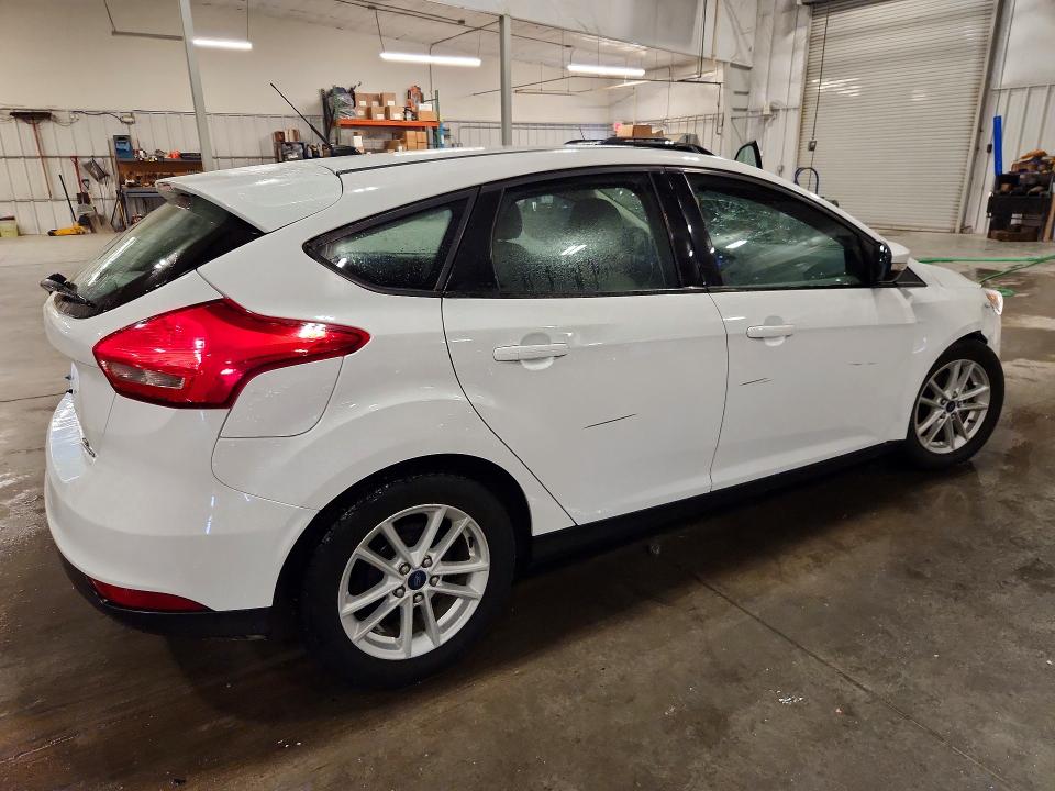 Photo 3 from auction – 2015 FORD FOCUS with VIN 1FADP3K25FL348600
