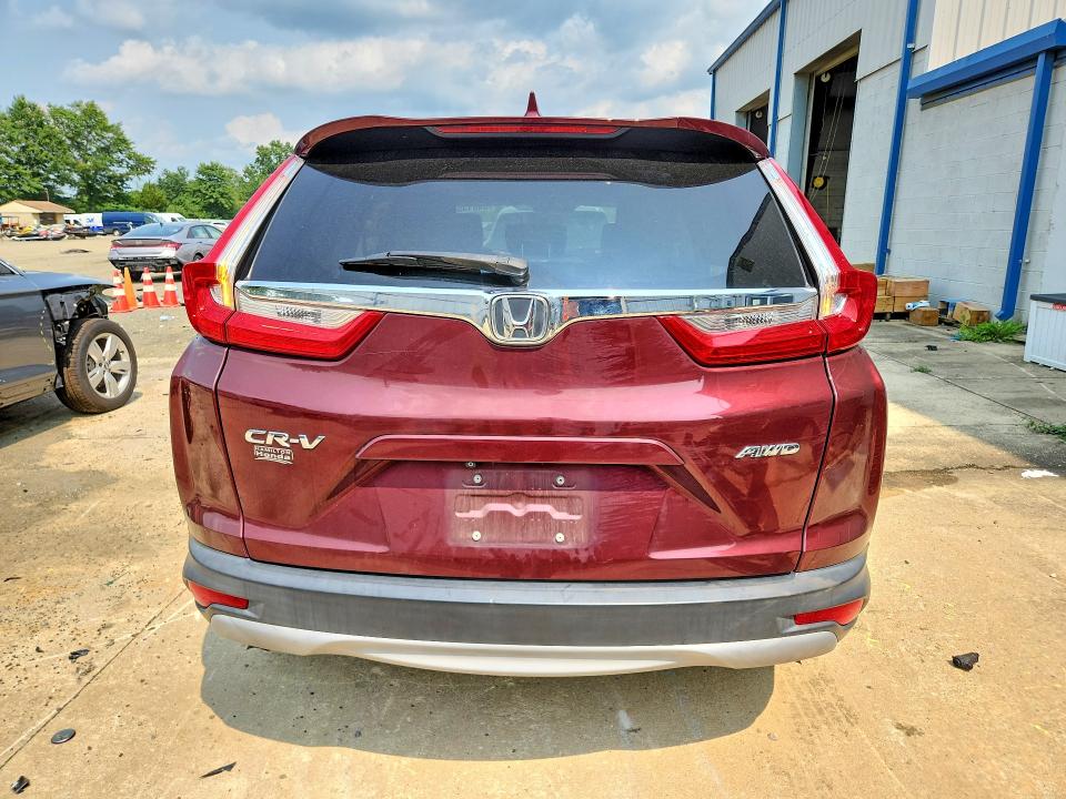 Photo 6 from auction – 2019 HONDA CR-V with VIN 2HKRW2H50KH620693