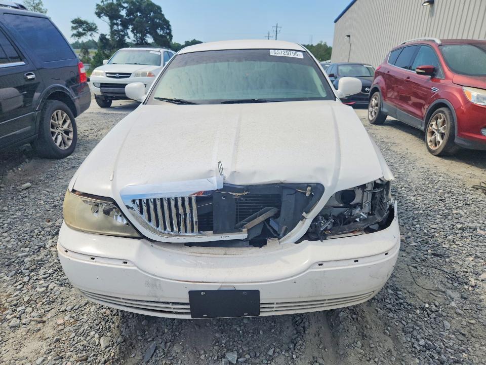 Photo 5 from auction – 2003 LINCOLN TOWN CAR with VIN 1LNHM81W13Y626697