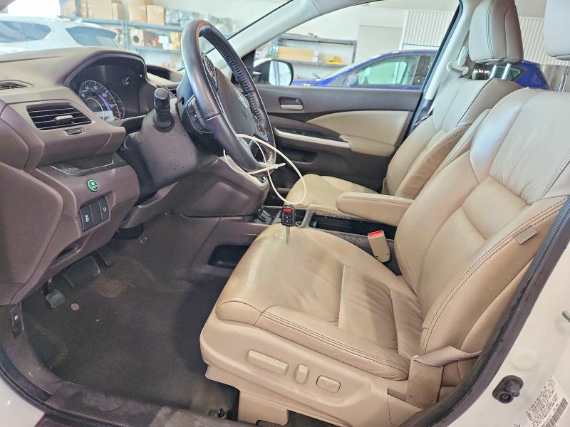 Photo 7 from auction – 2014 HONDA CR-V with VIN 5J6RM4H73EL091754