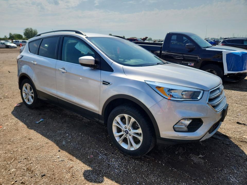 Photo 4 from auction – 2018 FORD ESCAPE with VIN 1FMCU9GD9JUA02480