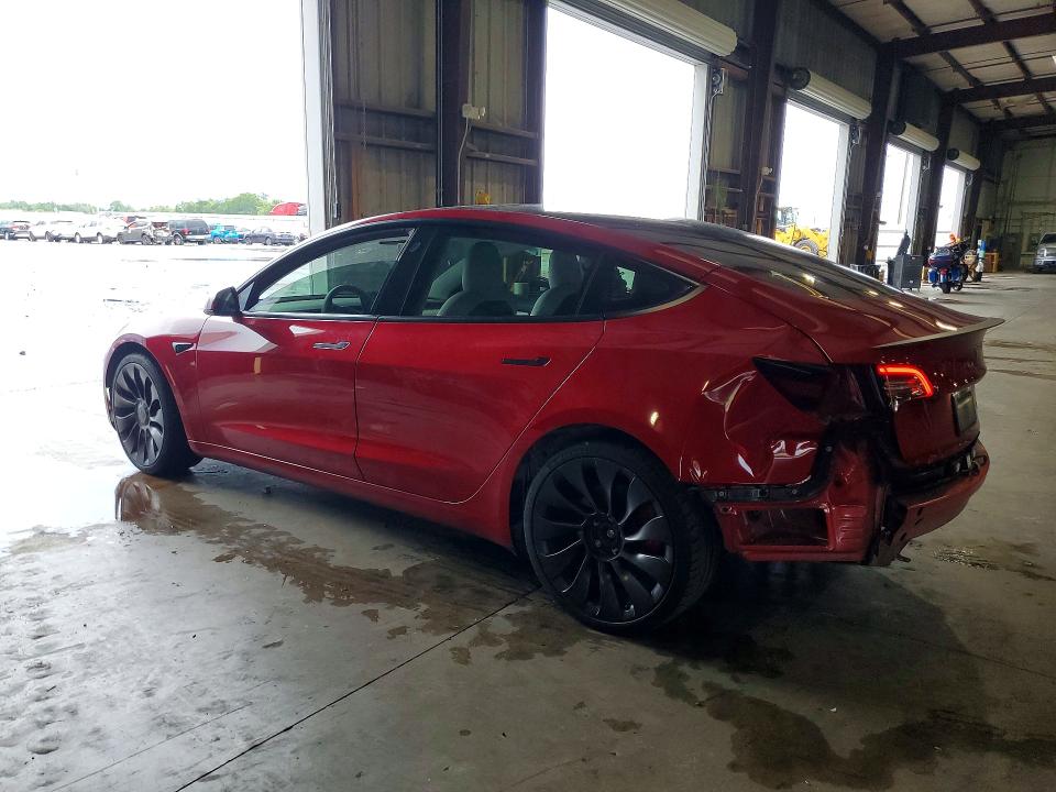 Photo 2 from auction – 2022 TESLA MODEL 3 with VIN 5YJ3E1EC2NF262411