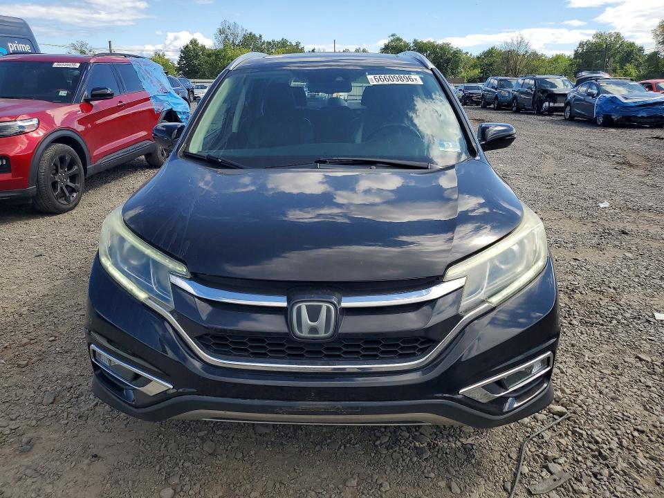 Photo 5 from auction – 2015 HONDA CR-V with VIN 5J6RM4H90FL093304