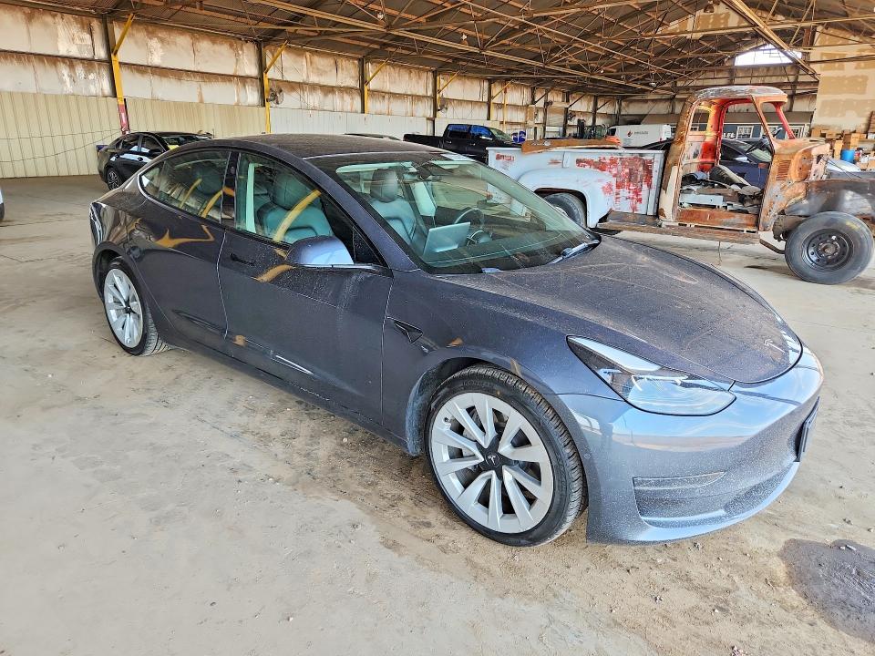 Photo 4 from auction – 2022 TESLA MODEL 3 with VIN 5YJ3E1EA8NF369347