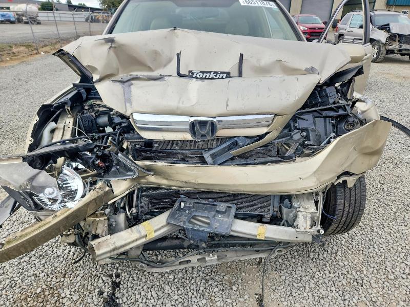 Photo 12 from auction – 2007 HONDA CR-V with VIN JHLRE38757C060573