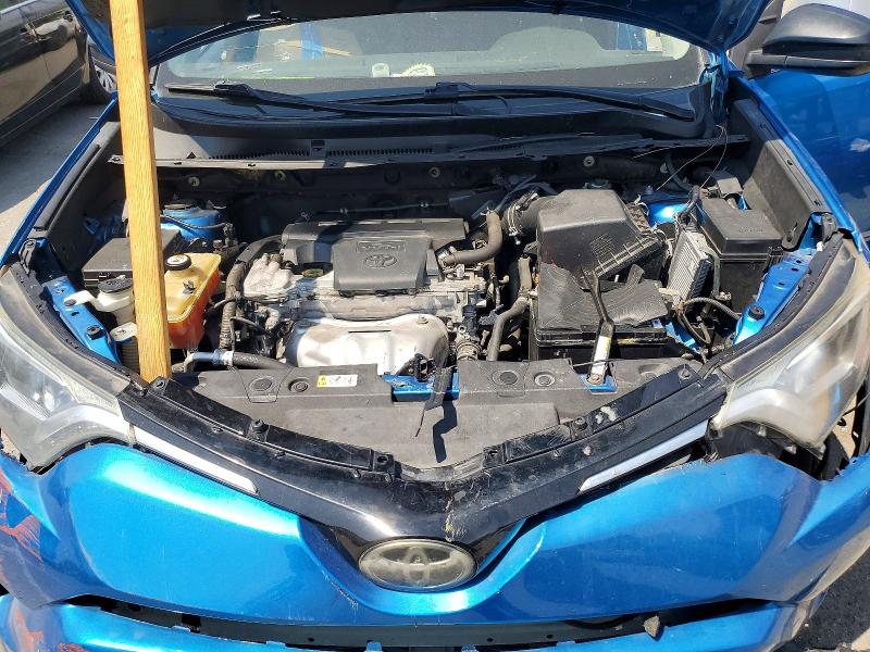 Photo 12 from auction – 2018 TOYOTA RAV4 with VIN JTMZFREV4JJ208781