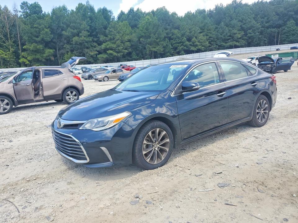 TOYOTA AVALON 2018 with VIN 4T1BK1EB4JU284712 - Photo from auction