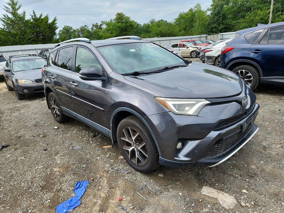 Photo 4 from auction – 2016 TOYOTA RAV4 with VIN JTMJFREV5GJ092271