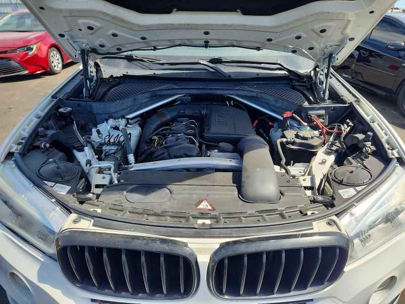 Photo 12 from auction – 2015 BMW X5 with VIN 5UXKR0C55F0P10248