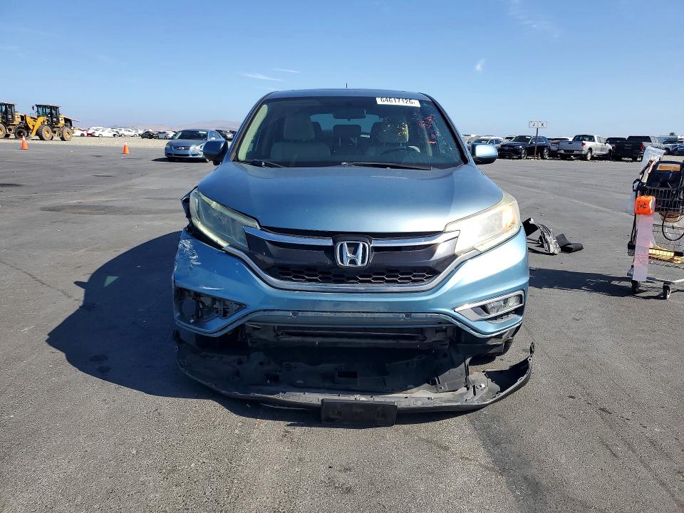 Photo 5 from auction – 2015 HONDA CR-V with VIN 2HKRM3H5XFH537984
