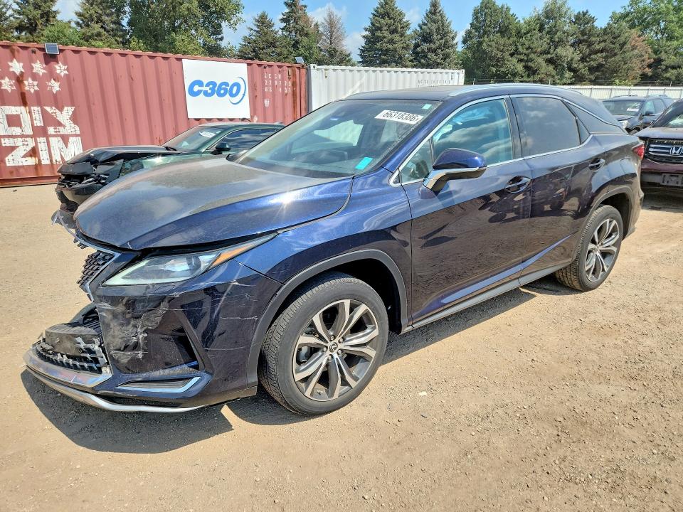 LEXUS RX 2021 with VIN 2T2HZMDAXMC287275 - Photo from auction