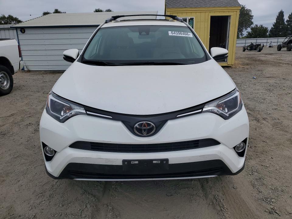 Photo 5 from auction – 2017 TOYOTA RAV4 with VIN JTMWFREV8HJ112360