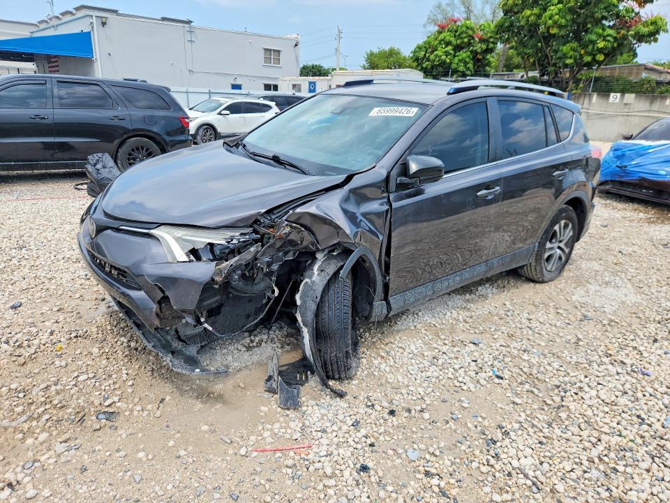 Photo 1 from auction – 2018 TOYOTA RAV4 with VIN JTMZFREV2JJ207306