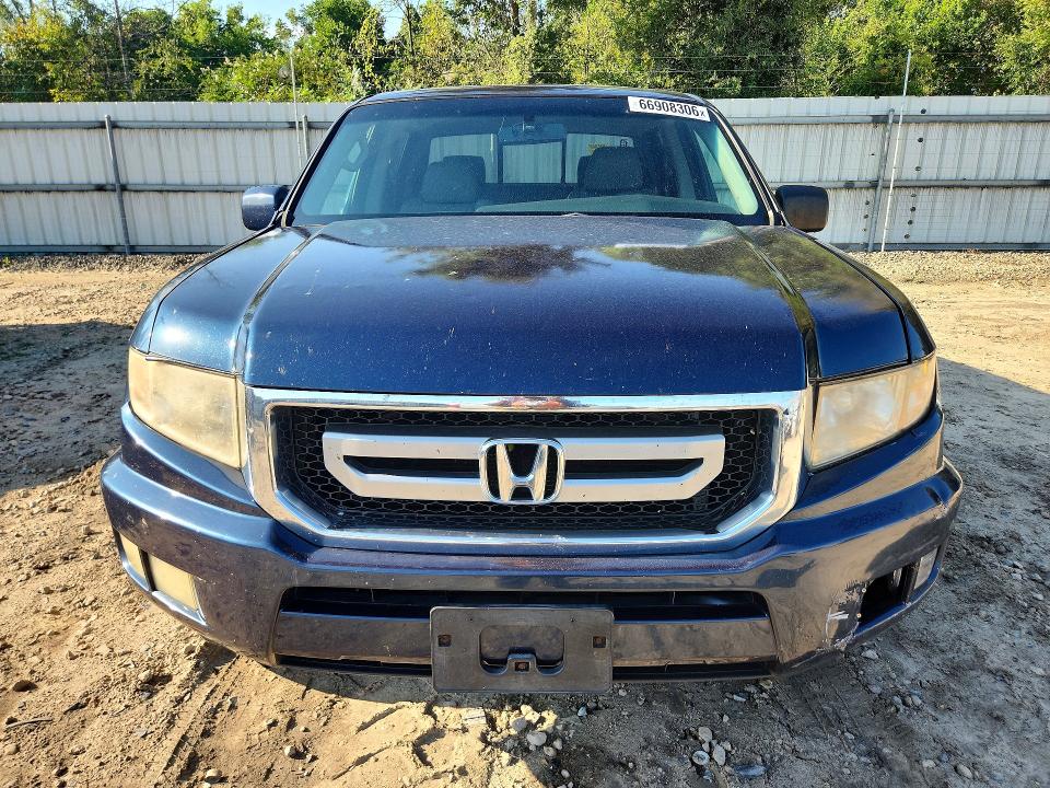 Photo 5 from auction – 2010 HONDA RIDGELINE with VIN 5FPYK1F59AB002457