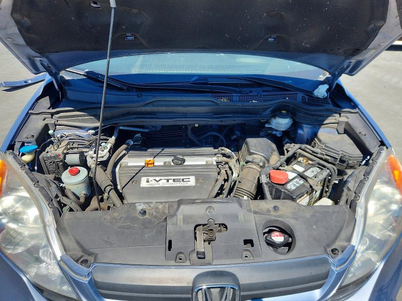 Photo 11 from auction – 2007 HONDA CR-V with VIN JHLRE383X7C009096