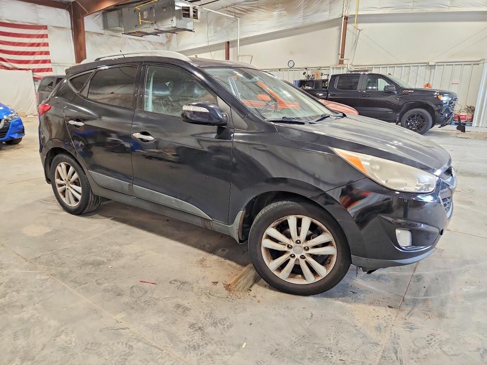 Photo 4 from auction – 2011 HYUNDAI TUCSON with VIN KM8JU3ACXBU295702