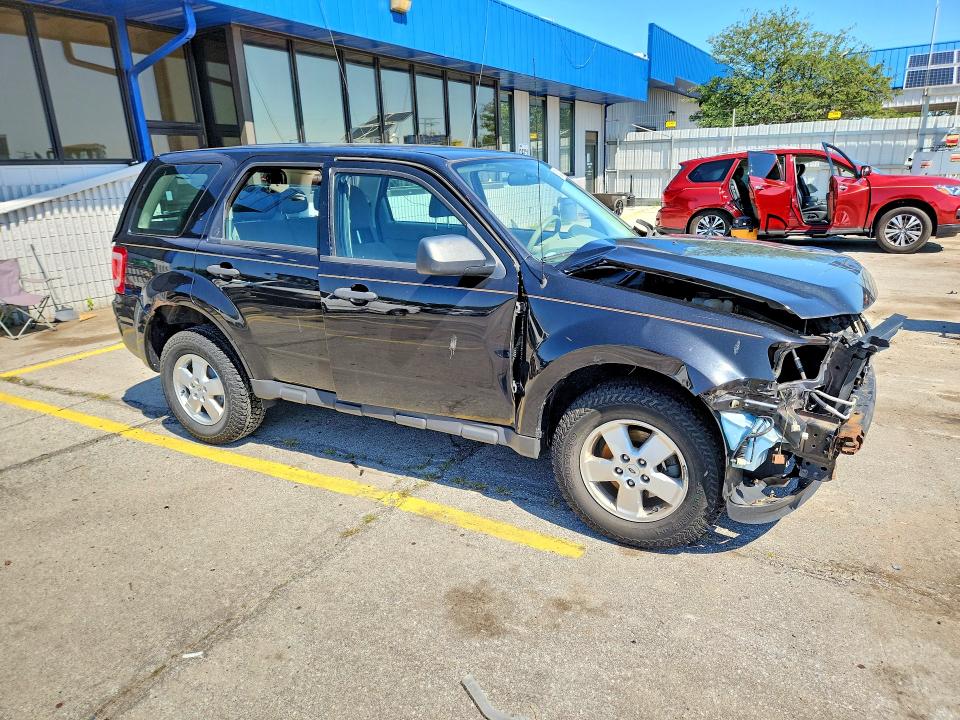 Photo 4 from auction – 2011 FORD ESCAPE with VIN 1FMCU0C76BKB33374